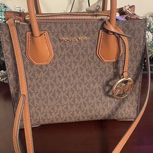 Michael Kors Brown Crossbody Bag with Monogram Pattern and Adjustable Strap